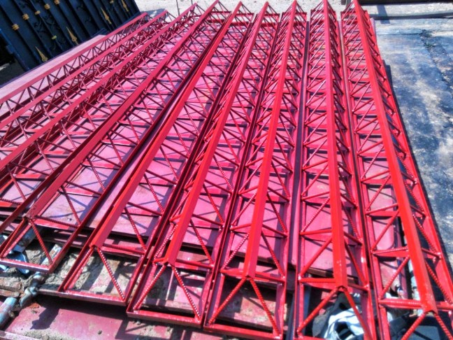 finished octet trusses sprayed and loaded in truck bed