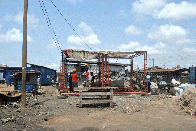 2-module & spacecraft erected edge of Agbogbloshie scrapyard