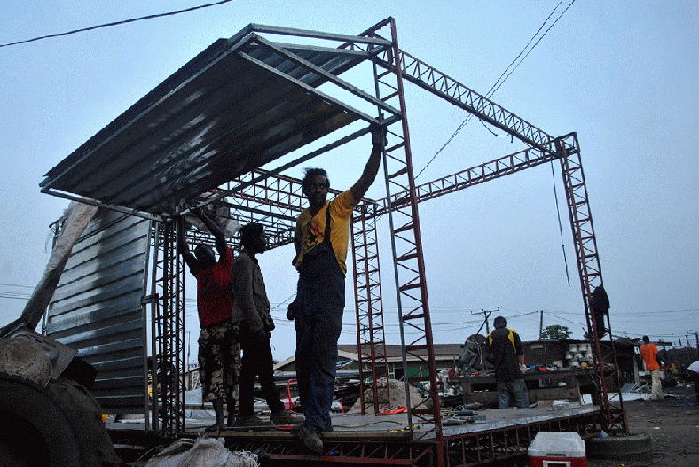 Brandon and crew chilling strong after first fab operable bifold hangar door